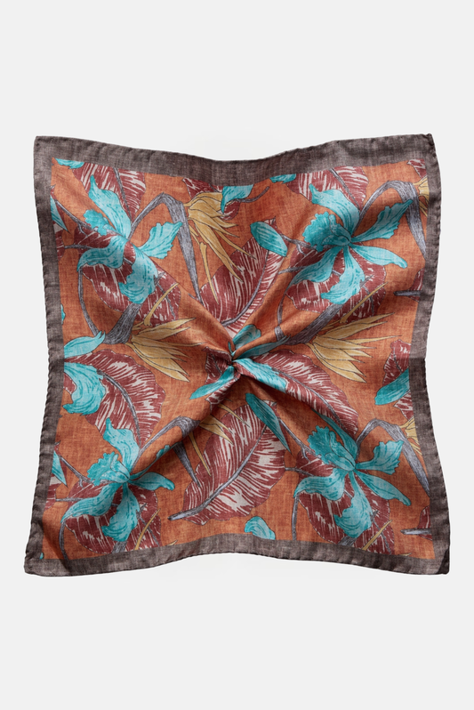 Pynteklud, orange med blomster